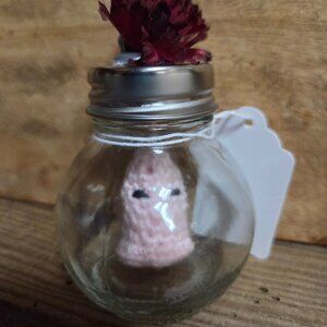 Crochet pink ghost in bubble jar
